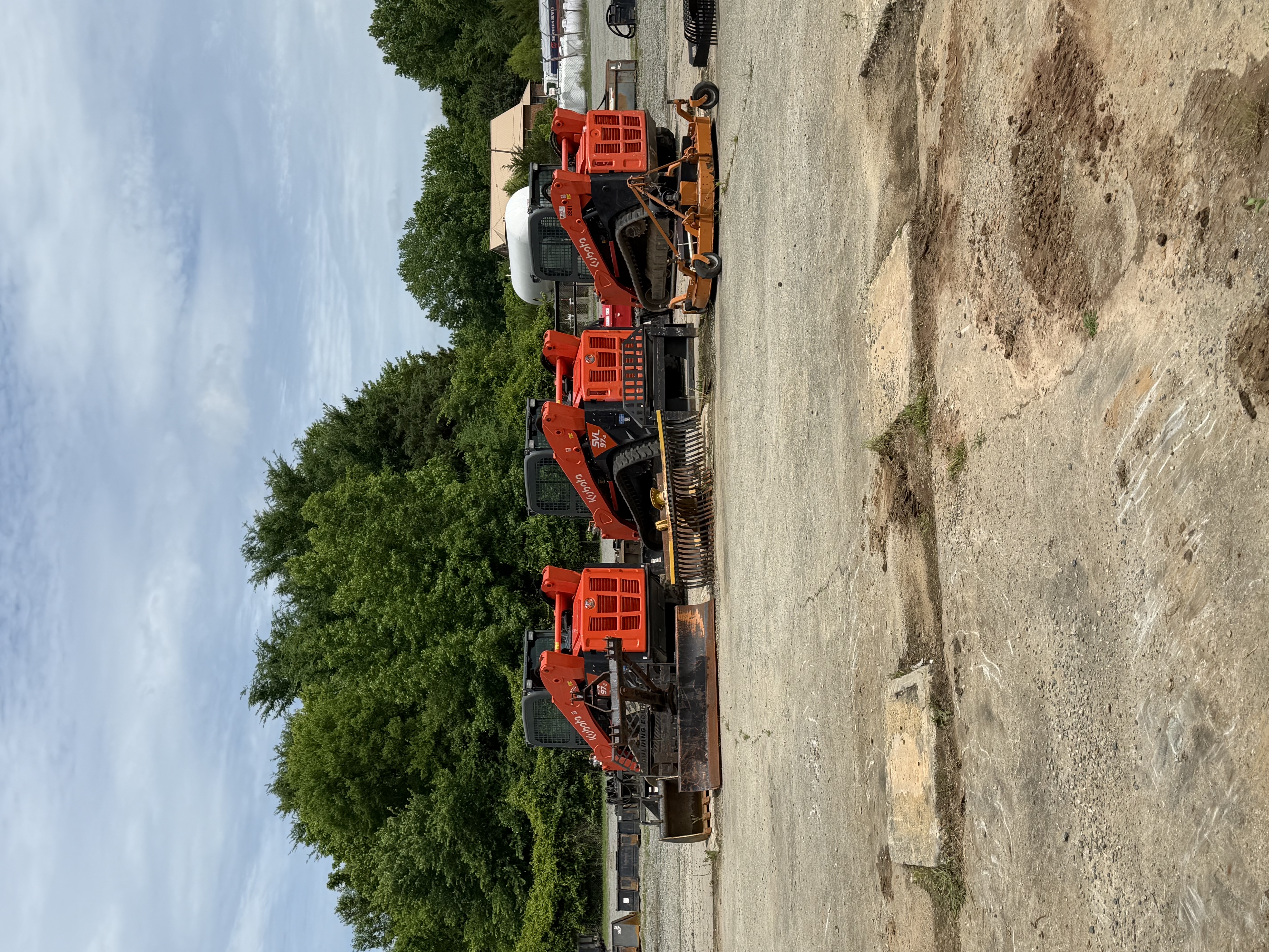 Kubota SVL97-2 compact track loaders lined up at 58 Equipment Rentals, Halifax County VA
